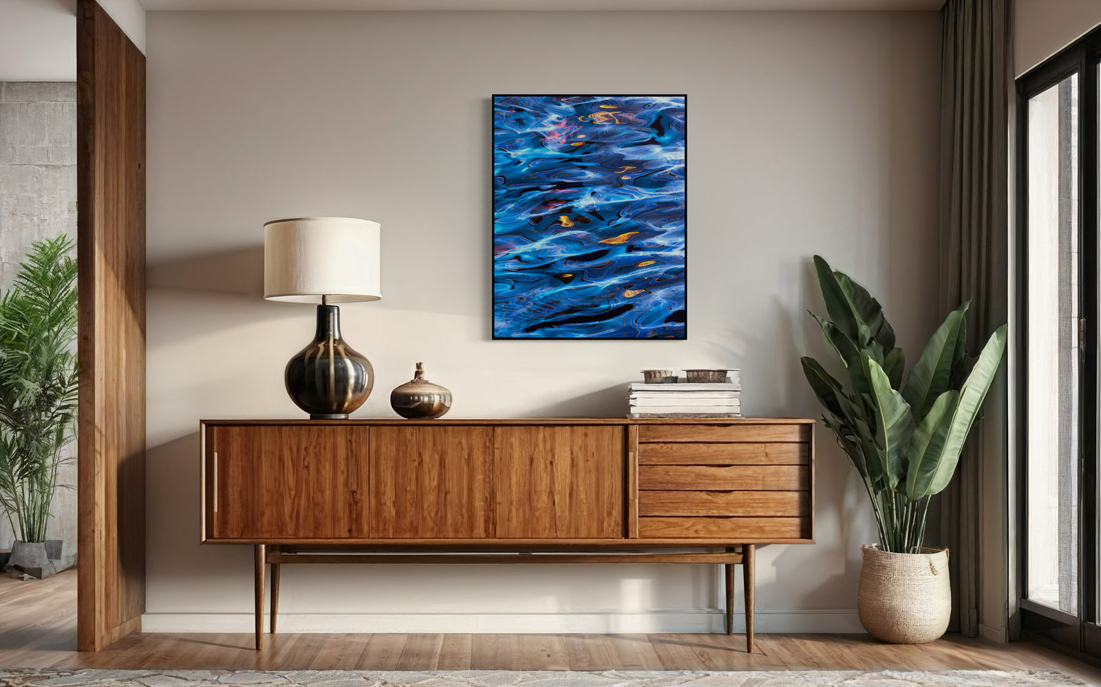 Abstract pattern of blue, orange, and black colors reflected in water